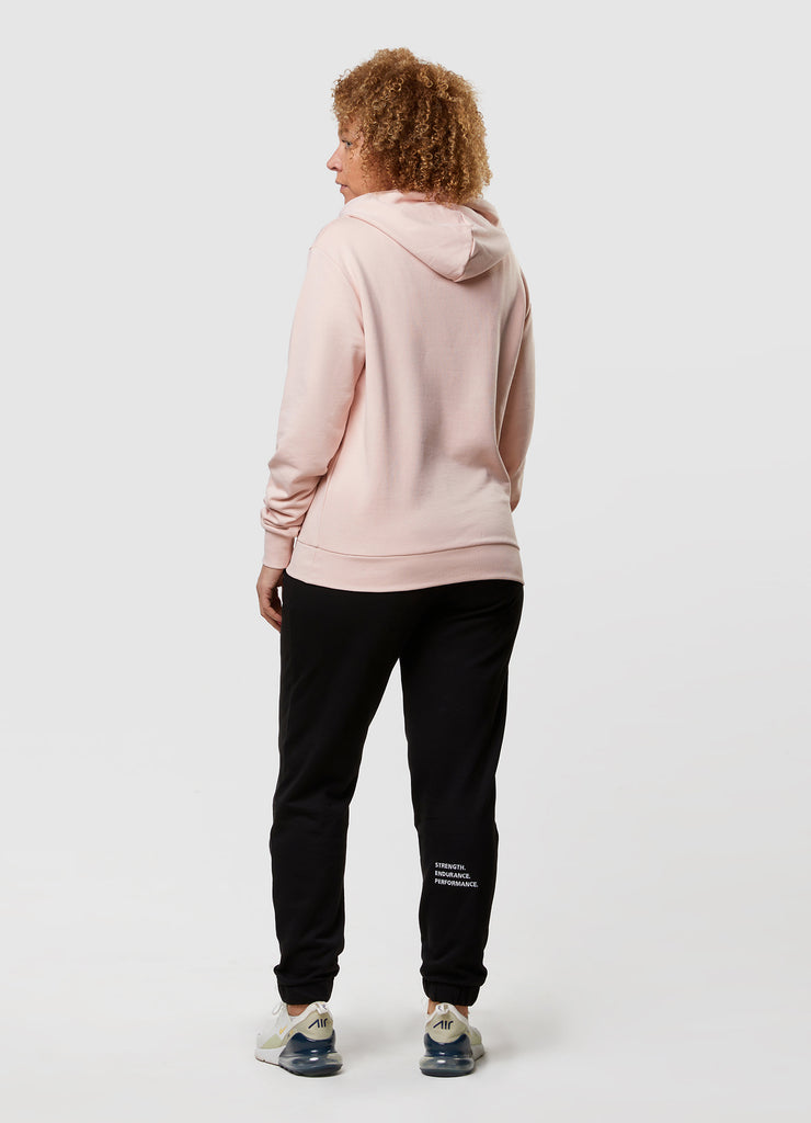 Woman wearing TRI-FIT Casualwear dusty pink hoodie