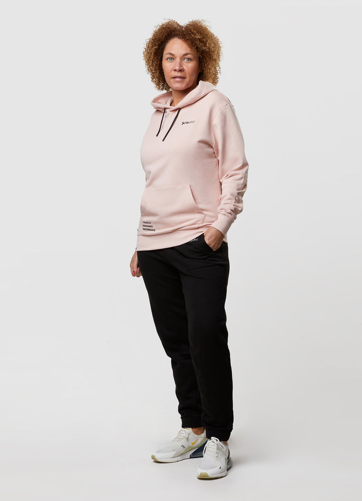 Woman wearing TRI-FIT Casualwear dusty pink hoodie