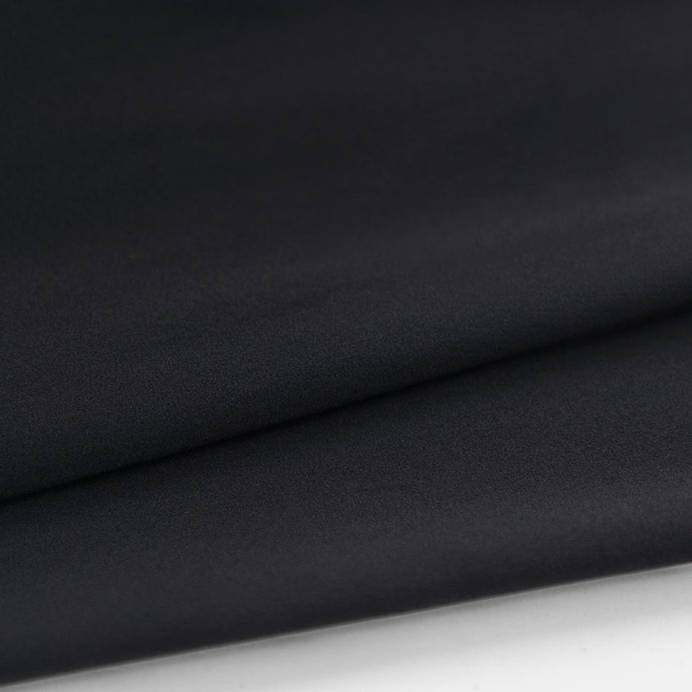 Close-up of TRI-FIT VORTEX Tri-Suit Black & White edition fabric – high-performance aero material