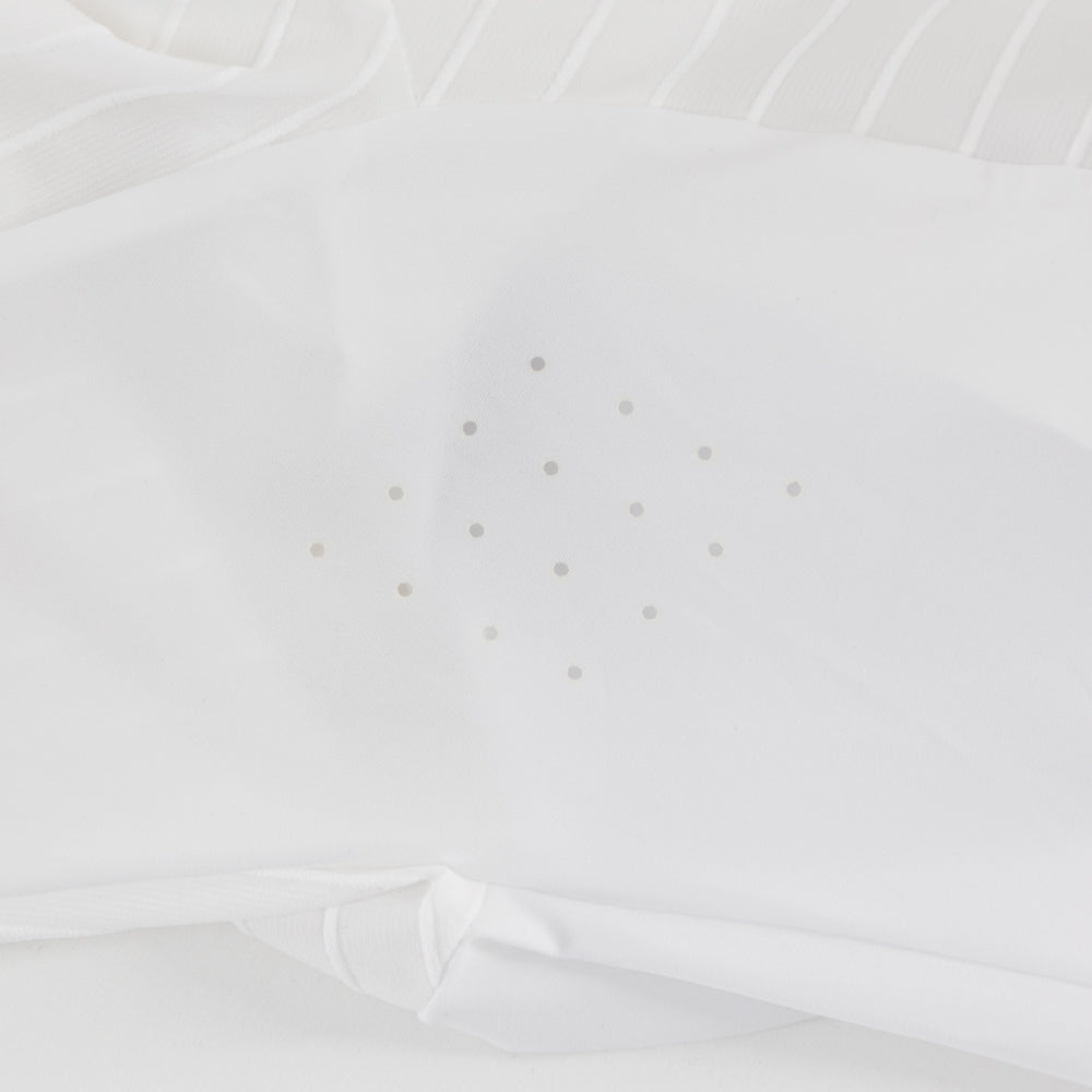 Detail of the laser-cut underarm ventilation on the white/black VORTEX triathlon suit