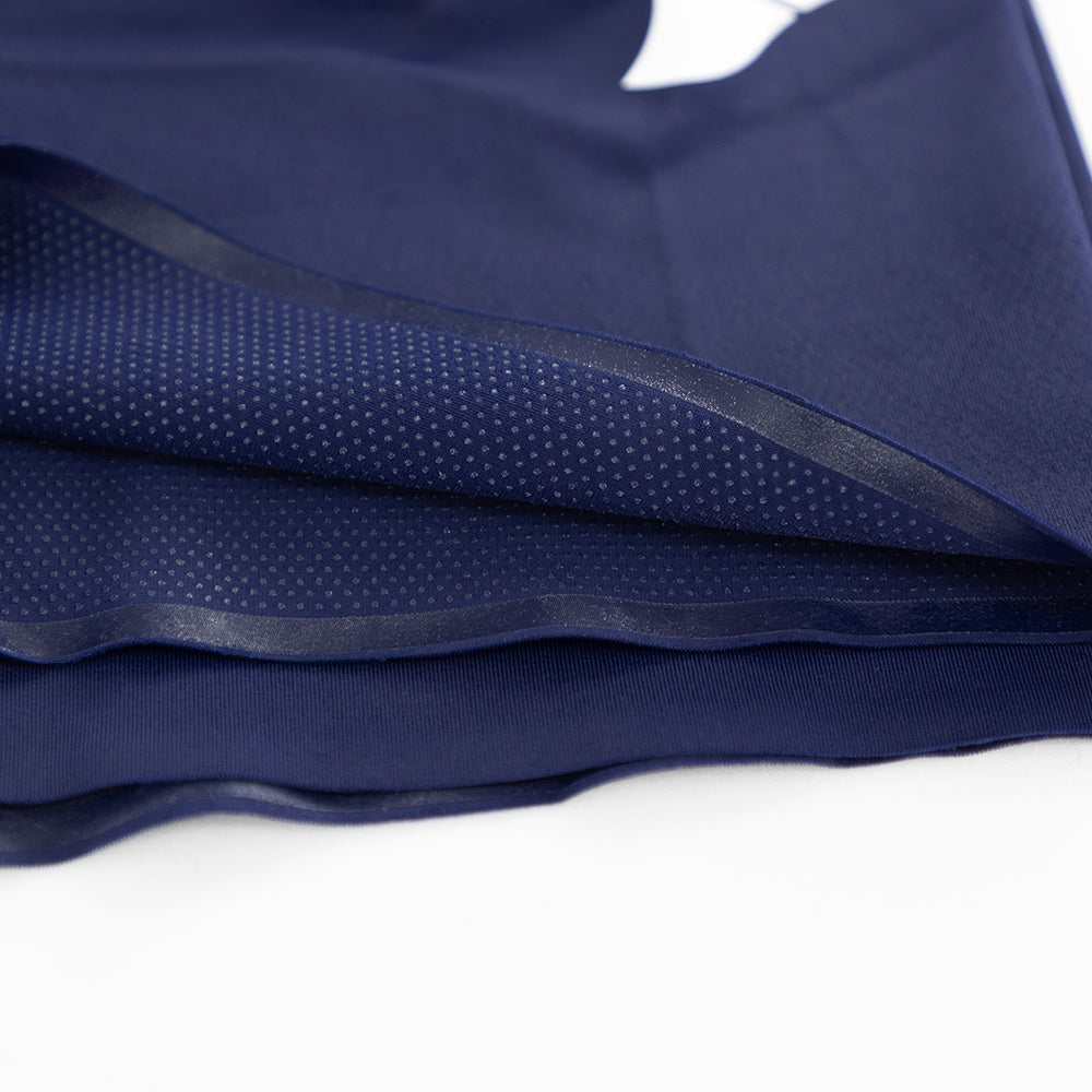 Silicone dot leg gripper detail on inner hem of men’s VANGUARD tri-suit, preventing ride-up during movement