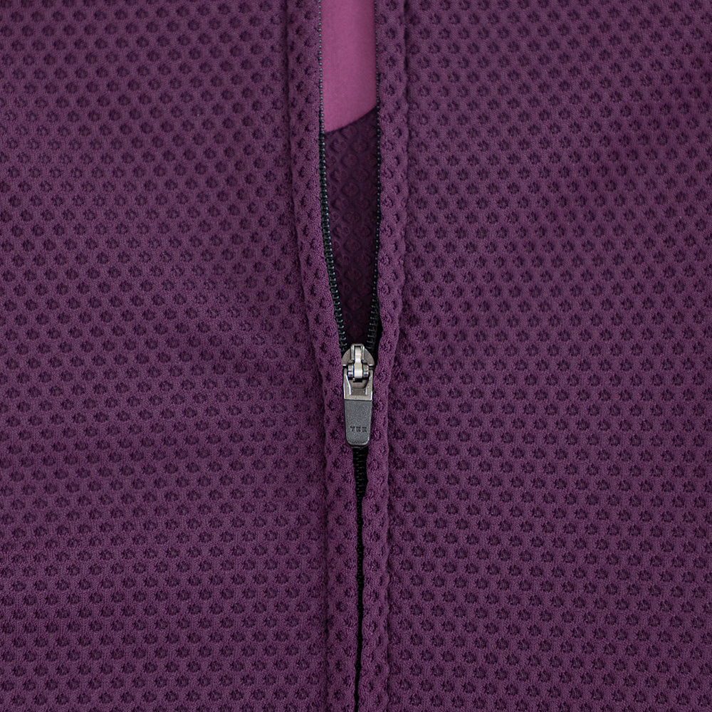 Detail of premium YKK zipper on TRI-FIT VANGUARD tri-suit front chest panel