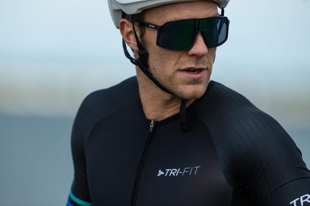 Close up of male in the black EVO mens tri suit